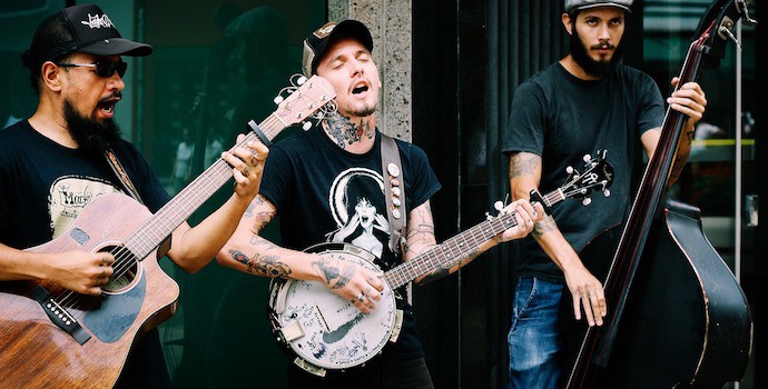 band member playing a banjo