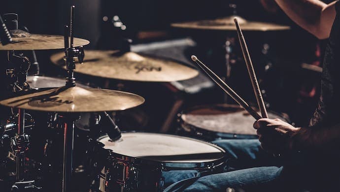 Drummer Playing Live in a Concert