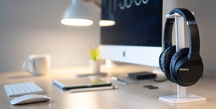 Sony Headphones Next to an iMac