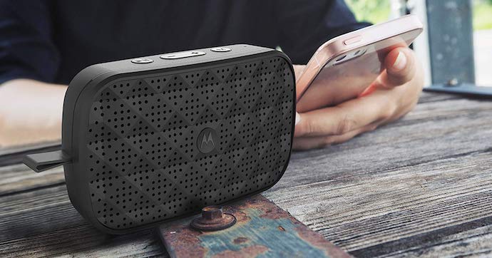 Bluetooth Speaker Next to a Smartphone