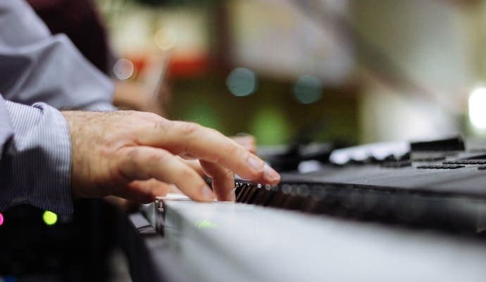 Musician Playing Portable Keyboard