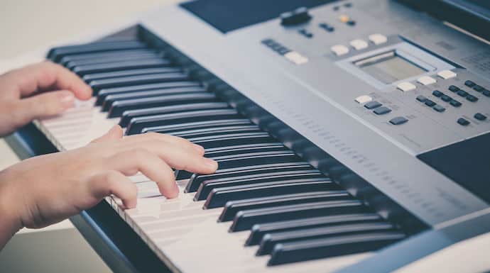 Kid Playing Keyboard