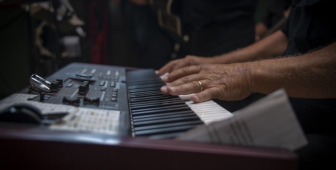 Musician Playing a Digital Piano