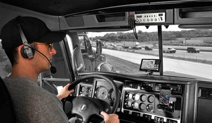 Trucket Wearing a Bluetooth Headset