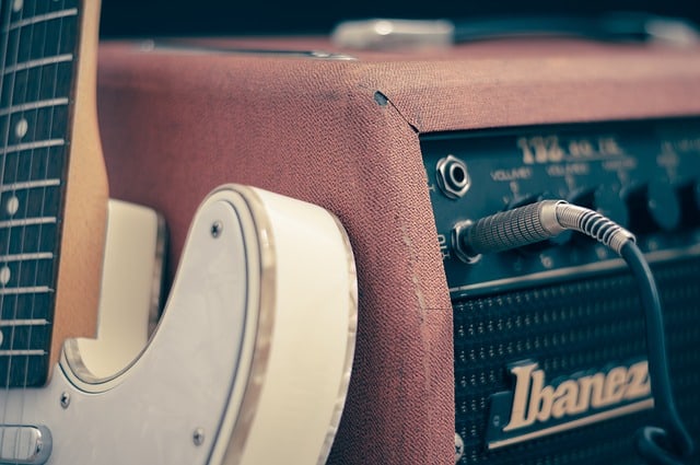 White Electric Guitar and Amp