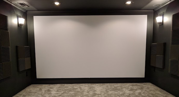 A White Acoustically Transparent Projector Screen