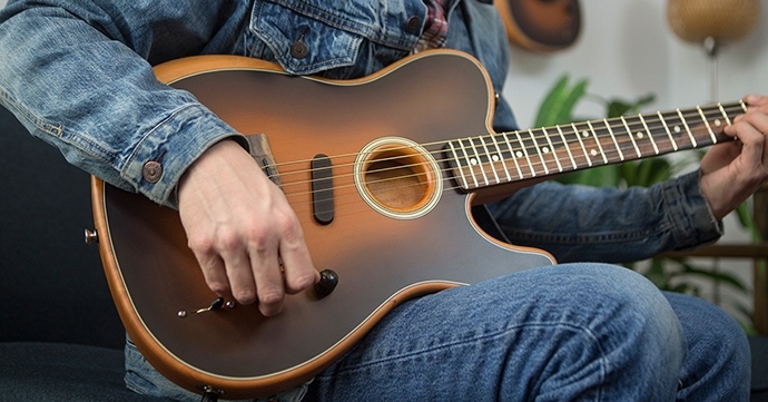 Playing a Thin Body Acoustic Guitar