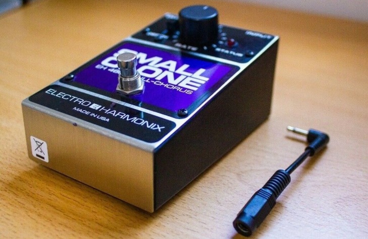 Acoustic Guitar Pedal on a Wooden Table