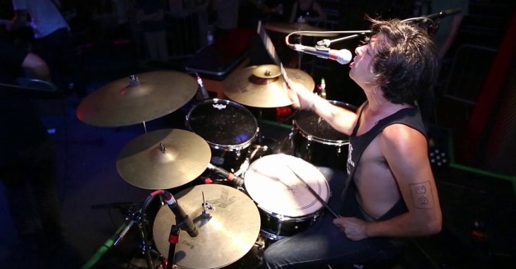 Drummer Singing on Stage